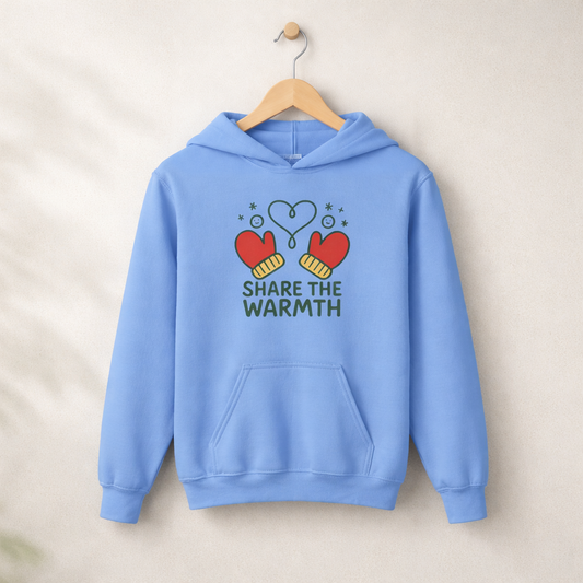 Share The Warmth – Kids Classic Hoodie Sweatshirt on a wooden hanger and wall peg, with a naturally collapsed hood