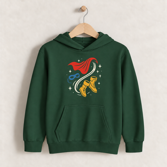 Superhero Cape & Mask Banana – Kids Classic Hoodie Sweatshirt on a wooden hanger and wall peg, with a naturally collapsed hood